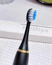 Load image into Gallery viewer, Hethya electric toothbrush,Sonic Electric Toothbrush T27 Electric Toothbrush with 4 Brush Heads Ultra Sonic Motor 3 Modes & Smart Timer Rechargeable Electric Toothbrush for Teenagers and Adults