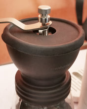 Load image into Gallery viewer, Pasenhome Hand operated grinders,manual coffee bean grinder with ceramic cone burr mill, 1 glass jar with ceramic burrs, suitable for drip coffee, Turkish beer, espresso, French press, family trip or camping