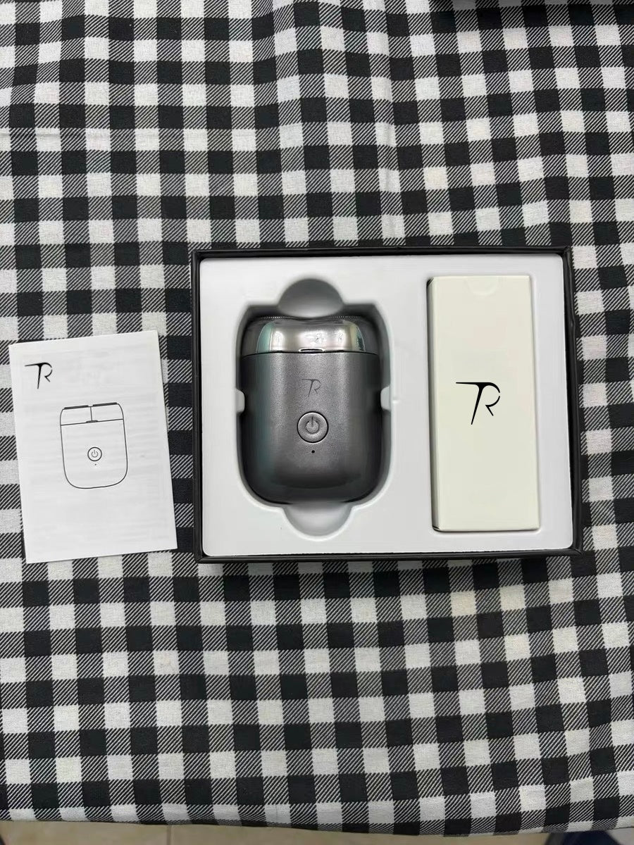 Electric shaver, portable, with independent floating head