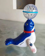 Load image into Gallery viewer, Chamvis action toy, plastic seal, will rotate, emit light and sound, blue
