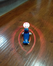 Load image into Gallery viewer, Chamvis action toy, plastic seal, will rotate, emit light and sound, blue
