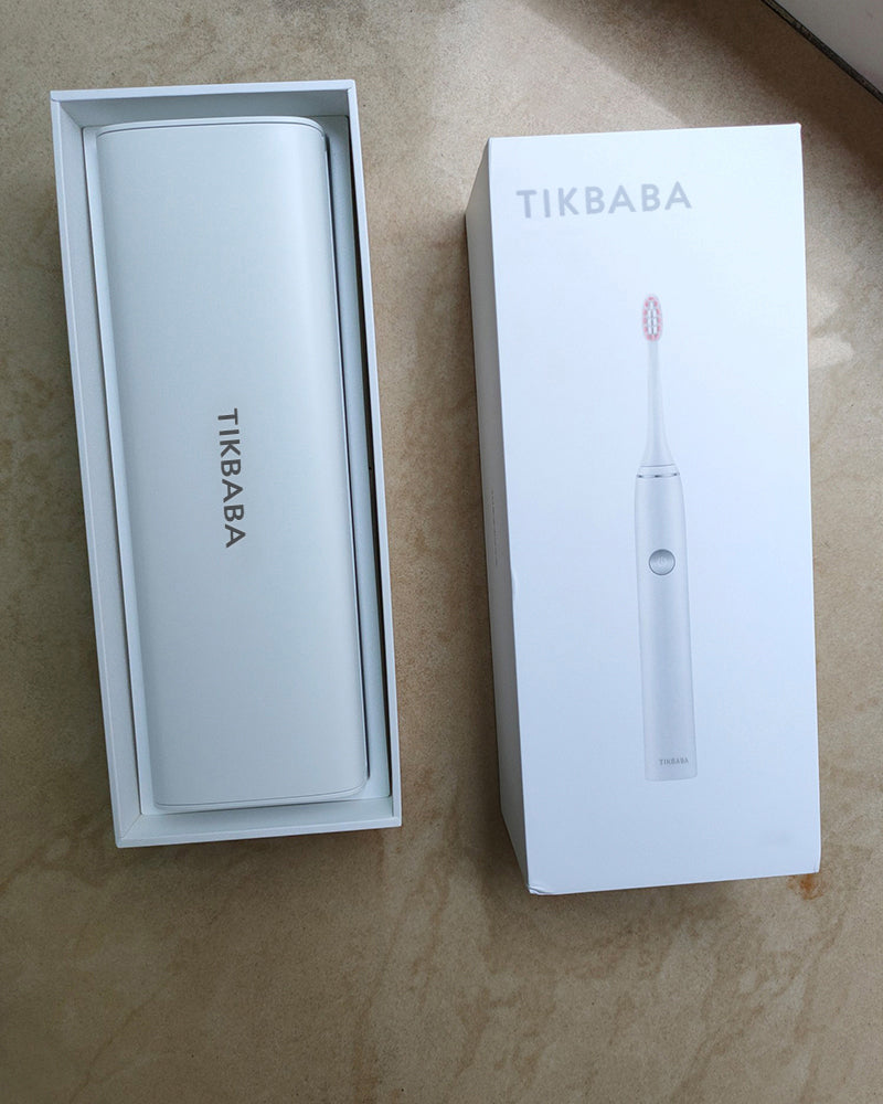 TIKBABA electric toothbrush with two toothbrush heads, powerful sonic cleaning rechargeable toothbrush, white