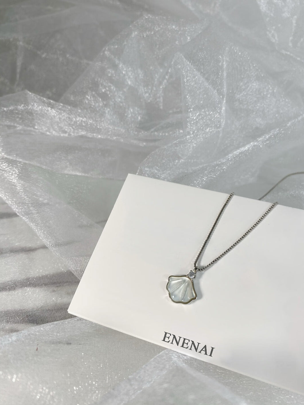 ENENAI Jewellery, shell shaped pendant crystal chain