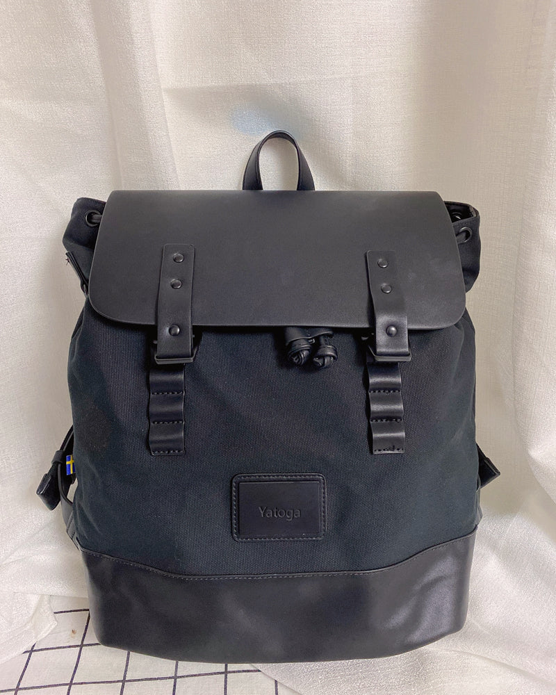 Yatoga backpack, men's 20-liter fashion schoolbag backpack, a combination of leather and fabric.